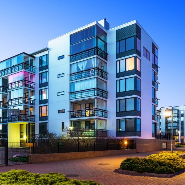 Modern real estate House building and city construction concept: evening outdoor urban view of modern real estate homes
